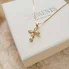 gold cross necklace aesthetic on elements by kristina branded box